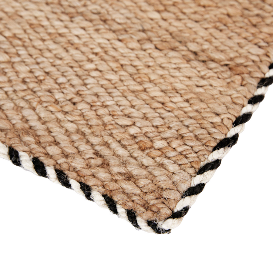 Detail Shot of Braided Jute Doormat With Black and White Trim